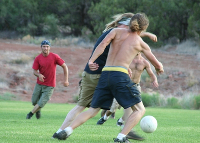 People playing soccer.
